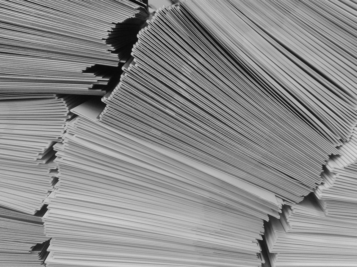 A stack of paper representing the NDIS reforms.